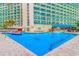 Outdoor pool area with lounge chairs and water features at 205 74Th Ave. N # 1601, Myrtle Beach, SC 29572