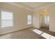 Well-lit bedroom featuring neutral walls and carpet at 363 Long Meadow Dr., Loris, SC 29569