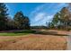 Scenic golf course view with lush green fairways and mature trees at 363 Long Meadow Dr., Loris, SC 29569