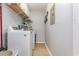 Convenient laundry room with washer, dryer, and overhead shelving at 3762 Citation Way # 1018, Myrtle Beach, SC 29577