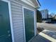 Private exterior storage unit with a green door at 3762 Citation Way # 1018, Myrtle Beach, SC 29577