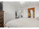 Main bedroom with large bed, dresser, and access to bathroom at 400 20Th Ave. N # 303, Myrtle Beach, SC 29577