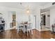 Bright dining area with table and chairs, kitchen and bathroom views at 400 20Th Ave. N # 303, Myrtle Beach, SC 29577