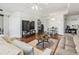 Spacious living room with hardwood floors, sofas, and dining area at 400 20Th Ave. N # 303, Myrtle Beach, SC 29577