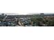 Aerial view of the neighborhood featuring residential houses, trees, and city skyline in distance at 6706 Bryant St. # B, Myrtle Beach, SC 29572