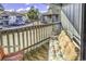 Relax on this cozy balcony with outdoor seating and enjoy community views and pleasant surroundings at 859 Tall Oaks Ct. # A, Myrtle Beach, SC 29588