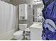 Functional bathroom with a shower-tub, neutral decor, and ample storage for toiletries and essentials at 859 Tall Oaks Ct. # A, Myrtle Beach, SC 29588