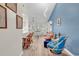 Open-concept living space with tall ceilings, modern lighting, and coastal-inspired decor at 859 Tall Oaks Ct. # A, Myrtle Beach, SC 29588