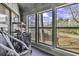 Enclosed sunroom bathed in natural light, perfect for relaxation and enjoying the view at 859 Tall Oaks Ct. # A, Myrtle Beach, SC 29588