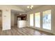 Dining area with patio doors and kitchen views at 9404 Chicory Ln., Murrells Inlet, SC 29576