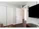 Bedroom features closet, tv, open door to another room, and Dallas Cowboys decor at 1049 Augustus Dr., Conway, SC 29527