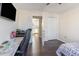 Bedroom with desk, view of kitchen, and closet at 1049 Augustus Dr., Conway, SC 29527