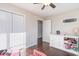 Spacious bedroom featuring hardwood floors and a large white dresser with decor at 1049 Augustus Dr., Conway, SC 29527