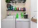 Functional laundry room with washer, dryer, and shelving at 1049 Augustus Dr., Conway, SC 29527