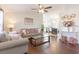 Bright living room featuring modern decor, hardwood floors, and an open floor plan at 1049 Augustus Dr., Conway, SC 29527