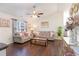 Open-concept living room with vaulted ceilings, stylish furnishings, and bright, natural light at 1049 Augustus Dr., Conway, SC 29527