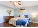 Primary bedroom boasts hardwood floors, a cozy decor, and a tray ceiling at 1049 Augustus Dr., Conway, SC 29527