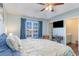 Primary bedroom showcasing natural light and a ensuite bathroom entrance at 1049 Augustus Dr., Conway, SC 29527