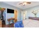 Primary bedroom with hardwood floors, closet, and ensuite bathroom entrance at 1049 Augustus Dr., Conway, SC 29527