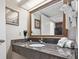 Clean bathroom with granite vanity and large mirror at 1105 S Ocean Blvd. # 620, Myrtle Beach, SC 29577