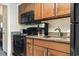 Kitchen features granite countertops and black appliances at 1105 S Ocean Blvd. # 620, Myrtle Beach, SC 29577