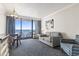 Living room with ocean view and balcony access at 1105 S Ocean Blvd. # 620, Myrtle Beach, SC 29577