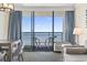 Living area with ocean view and balcony at 1105 S Ocean Blvd. # 620, Myrtle Beach, SC 29577