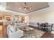 Bright and airy living room with hardwood floors and a view to the kitchen at 1113 Bluffton Ct., Myrtle Beach, SC 29579