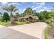 Brick home with palm trees and circular driveway at 2040 Woodburn Dr., Myrtle Beach, SC 29579