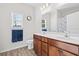 Clean bathroom with double vanity and neutral tones at 219 Lakota Loop, Longs, SC 29568