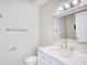 Bathroom boasts a vanity with quartz countertop and modern fixtures at 2409 Causey Dr., North Myrtle Beach, SC 29582