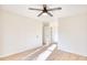 Bright bedroom with ceiling fan and light wood flooring at 2409 Causey Dr., North Myrtle Beach, SC 29582
