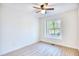 Simple bedroom with a window and ceiling fan at 2409 Causey Dr., North Myrtle Beach, SC 29582