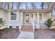 Charming house with a welcoming front porch and brick steps at 2409 Causey Dr., North Myrtle Beach, SC 29582