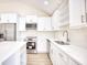 Modern kitchen with white cabinets and quartz countertops at 2409 Causey Dr., North Myrtle Beach, SC 29582