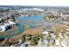 Wide aerial view of waterfront community and homes at 300 47Th Ave. S # 1C, North Myrtle Beach, SC 29582