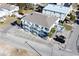 Aerial view of building, parking, and neighborhood context at 300 47Th Ave. S # 1C, North Myrtle Beach, SC 29582