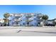 Building exterior with multiple balconies and parking at 300 47Th Ave. S # 1C, North Myrtle Beach, SC 29582
