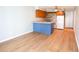 Updated kitchen with light wood cabinets and blue island at 300 47Th Ave. S # 1C, North Myrtle Beach, SC 29582