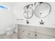 Bathroom with double vanity, large mirrors and a toilet at 306 Rivers Edge Dr., Conway, SC 29526