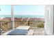 Outdoor deck with table and chairs, covered area, and views of the beach and ocean at 5300 Ocean Blvd. N, North Myrtle Beach, SC 29582