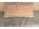 Welcome pillow and beach towel on bench at 5905 S Kings Hwy. # B130, Myrtle Beach, SC 29575