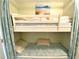 Built-in bunk beds with a beach-themed bedding set at 5905 S Kings Hwy. # B130, Myrtle Beach, SC 29575