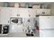 Cozy kitchen with white cabinets, microwave, and a small sink at 5905 S Kings Hwy. # B130, Myrtle Beach, SC 29575