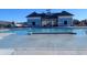 Community pool with a shallow end and clubhouse at 740 Hackberry Way, Longs, SC 29568