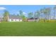 Large backyard with well-maintained lawn, perfect for outdoor activities at 800 Caines Landing Rd., Conway, SC 29526