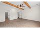 Spacious bedroom boasts hardwood floors, a ceiling fan, and multiple doorways leading to other rooms at 800 Caines Landing Rd., Conway, SC 29526