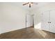 This bedroom has a ceiling fan, wood-look floors, and a closet at 800 Caines Landing Rd., Conway, SC 29526