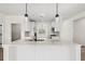 Elegant kitchen island with granite countertops, a sink, and stylish pendant lighting, perfect for entertaining at 800 Caines Landing Rd., Conway, SC 29526