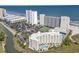 Aerial view of oceanfront property with pool and tennis court at 9400 Shore Dr. # 818, Myrtle Beach, SC 29572